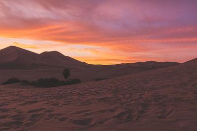 View of desert against scenic sky