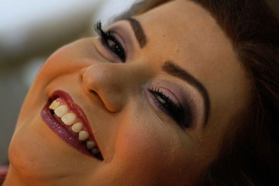 Close-up portrait of smiling bride