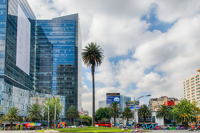 Modern buildings in city against sky