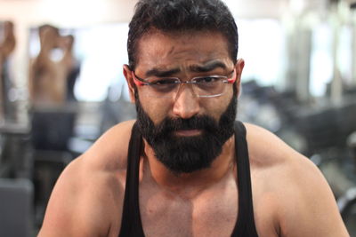 Portrait of bearded man in gym