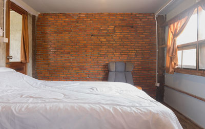 Brick wall in a bedroom
