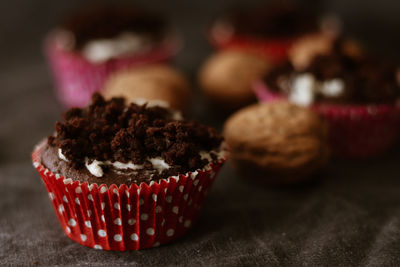 Close-up of cupcakes on cake