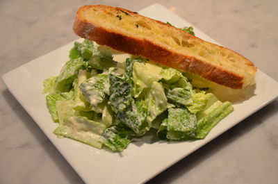 High angle view of sandwich in plate on table