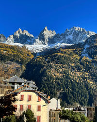 Scenic view of mountains against clear blue sky