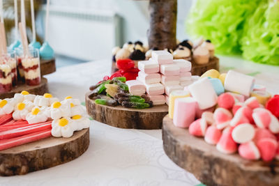 Close-up of multi colored candies on table