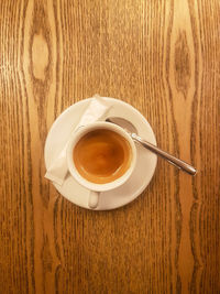 High angle view of coffee cup on table