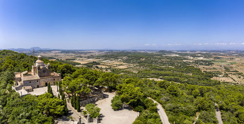 High angle view of trees and buildings against sky