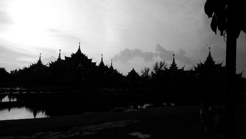 Built structure against sky at sunset