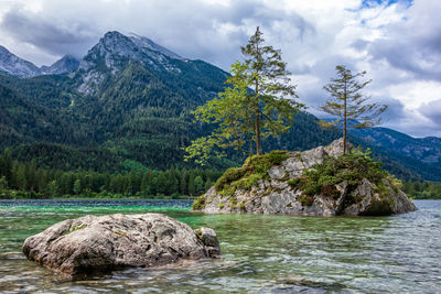 Scenic view of rocks in mountains against sky