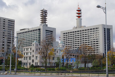 Buildings in city against sky