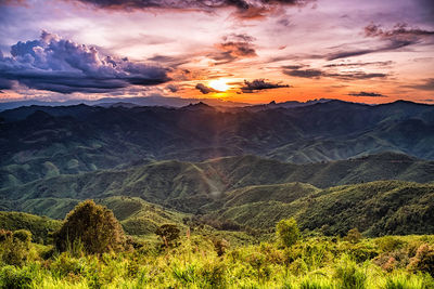 Scenic view of mountains against sky during sunset