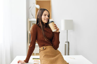 Young woman using mobile phone