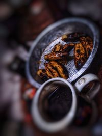 High angle view of rusty metal in container