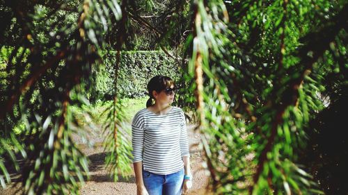 Woman standing in garden