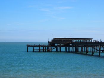 Scenic view of sea against blue sky