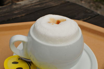 High angle view of coffee cup on table