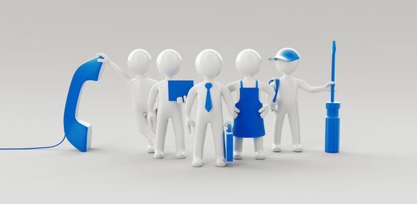 View of blue colored pencils in row against white background