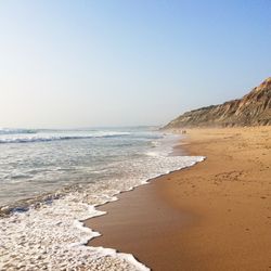 Scenic view of sea against clear sky