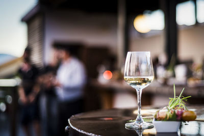 Close-up of wine glass on table