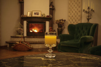 Tea light candles on table at home