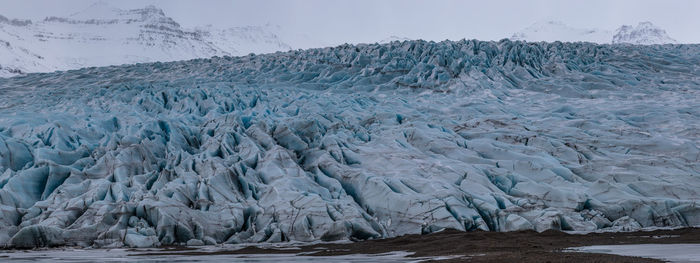 Full frame panoramic close-up of rugged glacier or glacial ice