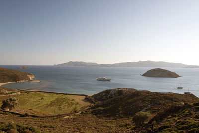 Scenic view of bay against clear sky