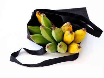 High angle view of fruits against white background