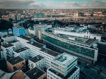 High angle view of buildings in city against sky