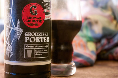 Close-up of beer glass bottle