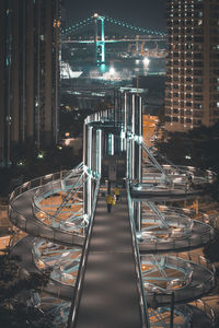 Aerial view of illuminated bridge at night