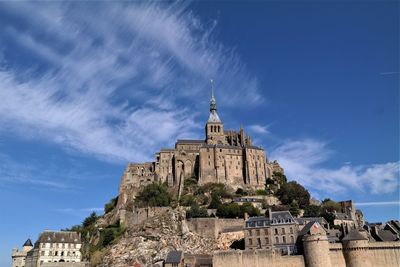 Low angle view of historic building against sky