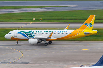 View of airplane at airport runway