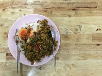 Directly above shot of food in plate on table