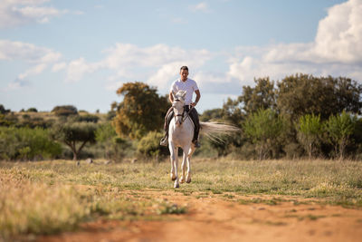 Man riding horse