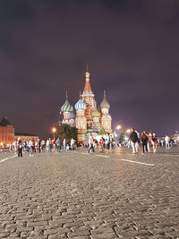 Group of people in front of historical building