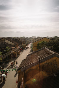 High angle view of road in city against sky