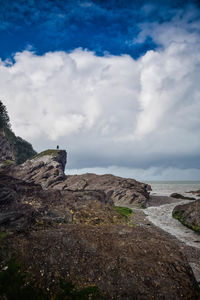 Rock formations on landscape against sky