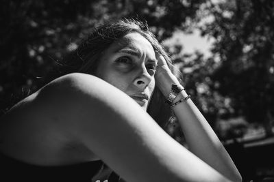 Portrait of young woman looking away 