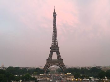 Tower of building against sky during sunset