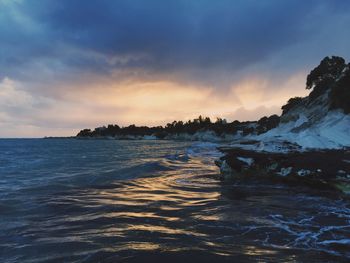 Scenic view of sea against sky during sunset
