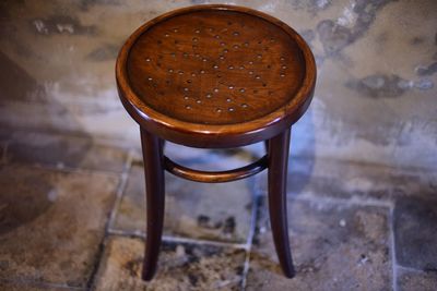 High angle view of empty stool on floor