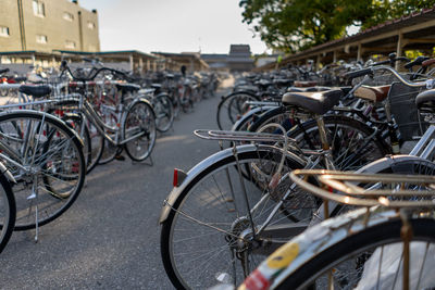 Bicycles parked on street in city