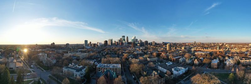 High angle view of modern buildings in city against sky