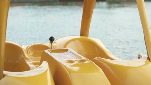 Close-up view of yellow pedal boat