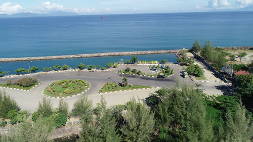 High angle view of plants by sea against sky