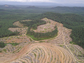 High angle view of land against mountains