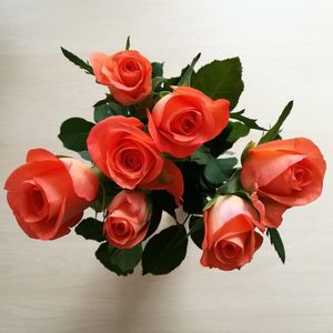 Close-up of red rose bouquet on table