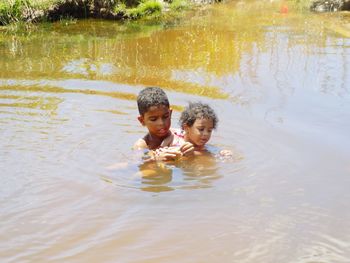 Boy playing in water