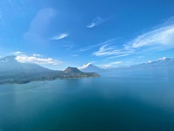 Scenic view of sea against blue sky