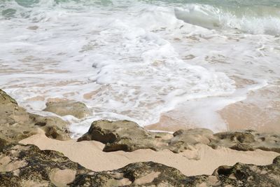 Close-up of waves on beach